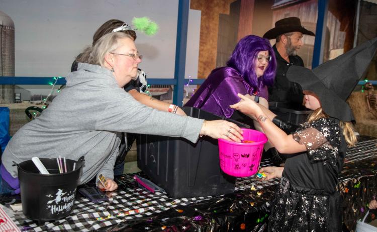 Matt Swearengin | Durant Democrat Candy was handed out during the Bokchito Trunk-or-Treat Oct. 30 at the community pavilion.