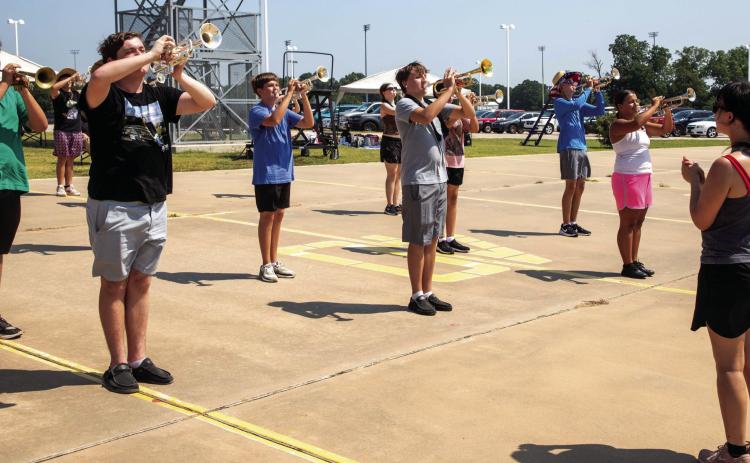 Durant High School band head drum major Taylor Chadwell directs band members during band camp last week. Matt Swearengin | Durant Democrat