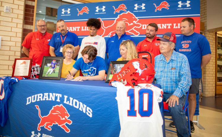 Durant High School football player Braylen Lyday signed to play with Southeastern in the fall. Among others shown are, Linda Patton, Lynetta Lyday and Jimmy Patton. Matt Swearengin | Durant Democrat