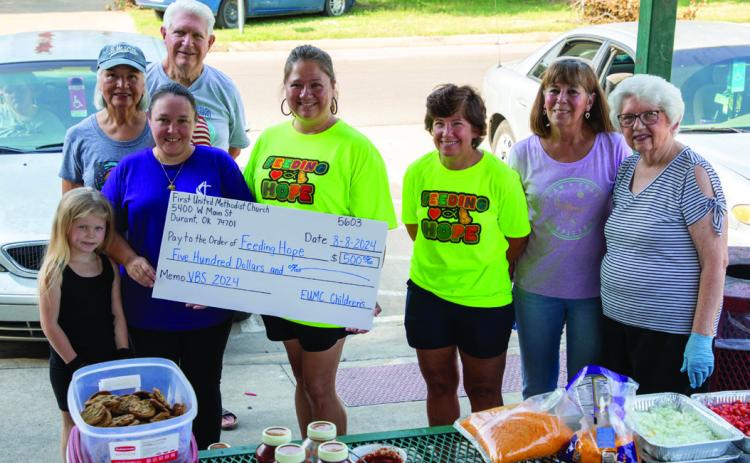 Durant First United Methodist Church Children’s Ministry made a $500 donation to Feeding Hope last week which was from funds children raised during Vacation Bible School that were matched. Front row, left, Orlena Dunn, Mardi Dunn, children’s ministry director; Keri Juarez, Feeding Hope director, Diane Dixon, Pat Thresher and Kay Eggleton. In the back are Pearl Dry and Gordon Eggleton. Matt Swearengin | Durant Democrat