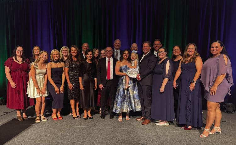 Northwest Heights Elementary School STEM teacher Kasey Bennett is shown with family and Durant School District faculty, sta and administrators after she was named Oklahoma Teacher of the Year. Photos provided