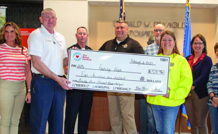Feeding Hope received a donation from the Our Blood Institute Greater Good program. The funds were contributed as a result of a recent blood drive between the Durant Police Department and the Durant Fire Department. Matt Swearengin | Durant Democrat