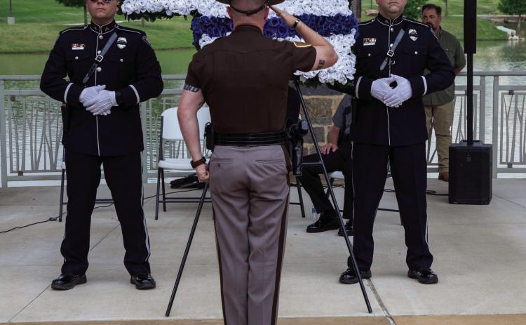 Fallen law enforcement ocers were honored and remembered May 15 during a ceremony at the Choctaw Nation Amphitheater. Matt Swearengin | Durant Democrat