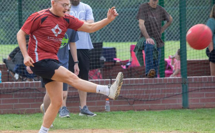 Durant Young Professionals had a kickball tournament May 4 at Lloyd Plyler Park. Jhet Weger of First Texoma National Bank kicks the ball.