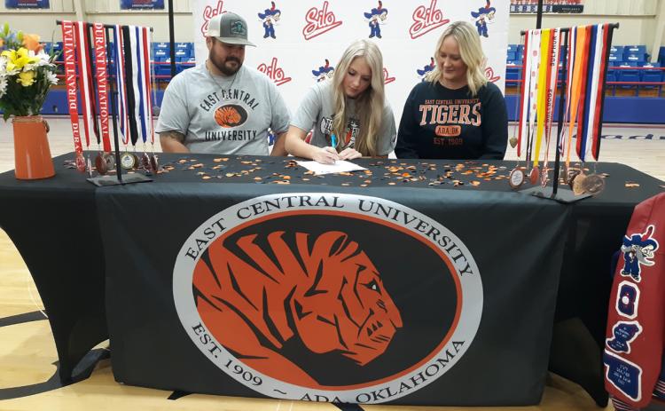 Silo senior Mallory Womeldorff signed a scholarship with East Central University where she will be on the track team. Kevin Farr | For the Democrat