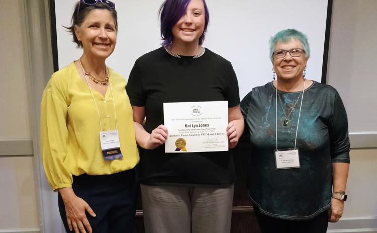 Kai Jones receives their recognition as the first runnerup for the Dr. Anthony Fauci Award in STEM and Classics at the annual conference of the Classical Association of the Middle West and South (CAMWS) Photo provided