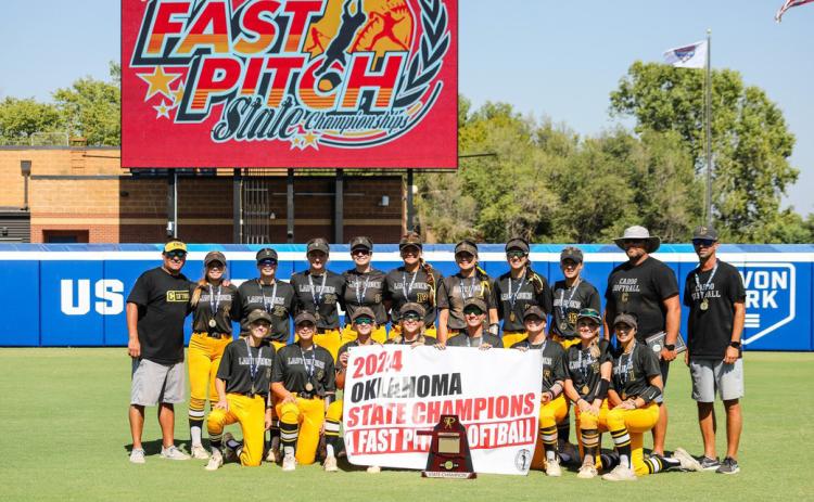 The Caddo Lady Bruins softball team poses after winning a state championship. Photo provided