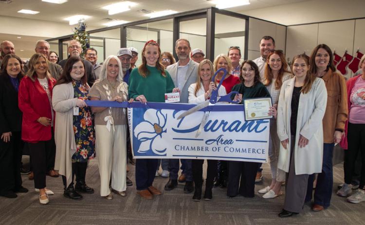 A ribbon cutting from the Durant Area Chamber of Commerce was held during Vision Bank’s open house to celebrate remodeling on the inside. Matt Swearengin | Durant Democrat
