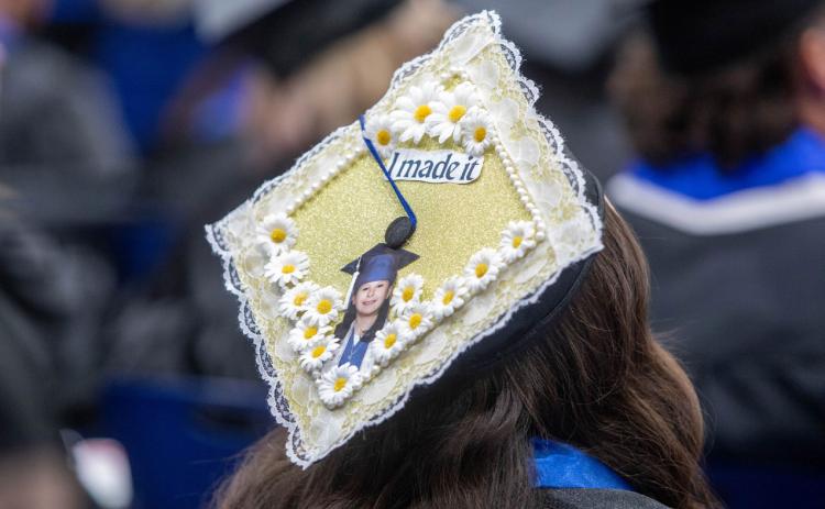 Madilyn Verde was among graduates who decorated her mortarboard for Southeastern Commencement. Matt Swearengin | Durant Democrat