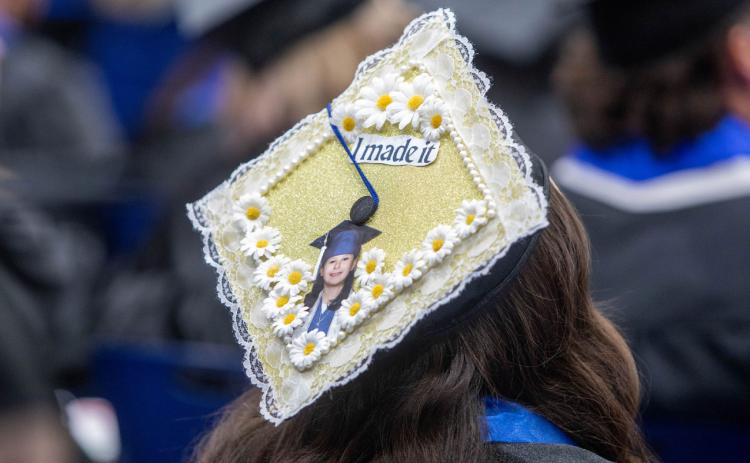 Madilyn Verde was among graduates who decorated her mortarboard for Southeastern Commencement. Matt Swearengin | Durant Democrat
