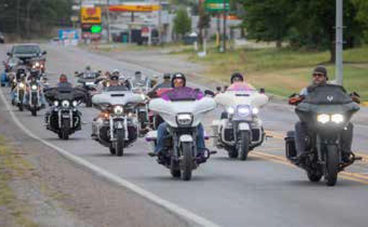 Members of the Three Valley Riders motorcycle club ride to the memorial service for Mike Morris last Saturday at the Southeastern Visual &amp; Performing Arts Center. Matt Swearengin | Durant Democrat