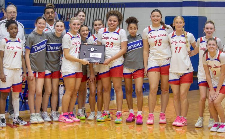 The Durant Lady Lions basketball team poses after the regional consolation on Saturday. Matt Swearengin | Durant Democrat