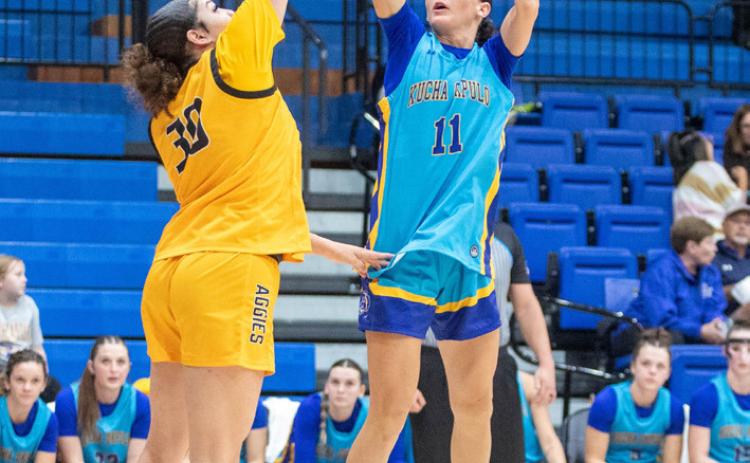 Southeastern basketball player Kenzli Warden faces a Cameron player in a recent game. Matt Swearengin | Durant Democrat