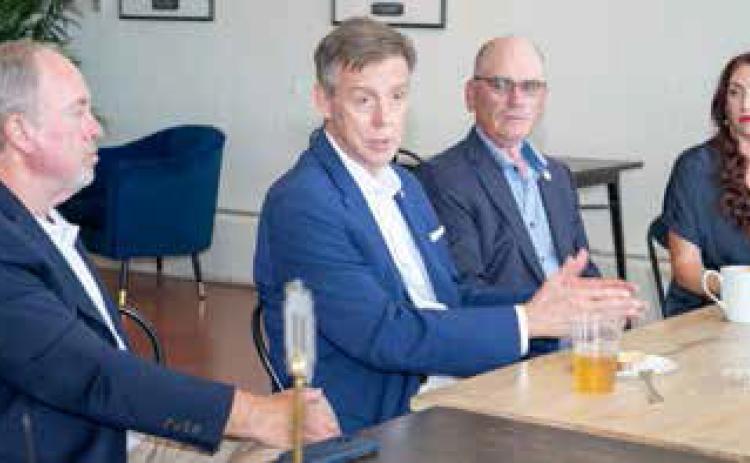 Mike Mazzei, middle, Republican candidate for Oklahoma governor, speaks during an economic roundtable discussion last week at Opera House Coffee in Durant. On the right is Durant Area Chamber of Commerce CEO Kara Byrd. Matt Swearengin | Durant Democrat