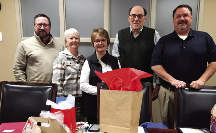 January is School Board Recognition Month and members of the Durant Board of Education received gifts thanking them for their service. From left, board members Chaz Polk, Joyce Northcutt and Janie Umsted, board Vice President Paul Buntz and President Jason Manous. Matt Swearengin | Durant Democrat
