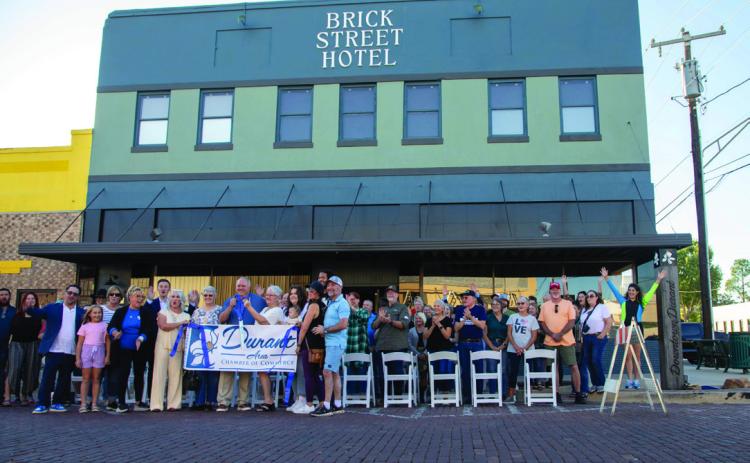 Brick Street Hotel on North Third Avenue and Evergreen St. in downtown Durant had an open house and a ribbon cutting from the Durant Area Chamber of Commerce Sept. 26. The building currently has Airbnb rentals and will soon have hotel rooms and a restaurant. Matt Swearengin | Durant Democrat