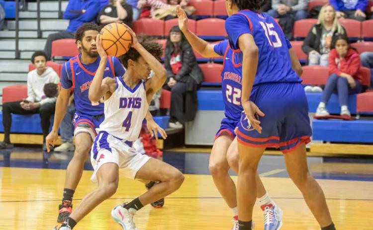 Durant boys snap skid with McAlester win