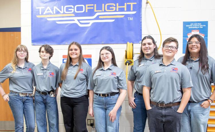 Durant High School aviation students are from left, Melanie Nester, Payton Dvorak, Emma Sherrer, Farah Barton, Nicholas Stormer, Caiden Todd and Isiah Zuniga. There was an open house last Thursday at the high school for the new aviation lab. Matt Swearengin | Durant Democrat