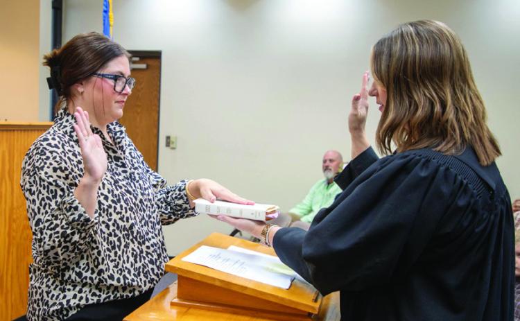 Kylie House was sworn in last week as interim Bryan County Assessor by Bryan County Associate District Judge Abby Rogers. She is filling the remainder of Mike Hull’s term, who retired and House plans to file for the oce in April 2026.  Matt Swearengin | Durant Democrat 