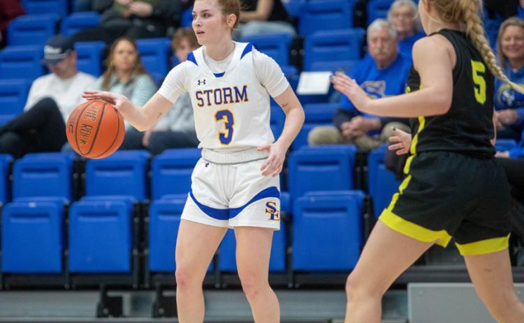 Southeastern basketball player Stevie Stinchcomb dribbles the ball. Matt Swearengin | Durant Democrat