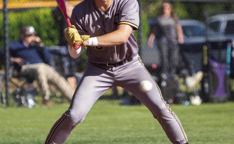 Calera Bulldog Logan Bumgarner is up to bat in a recent home game. Matt Swearengin | Durant Democrat