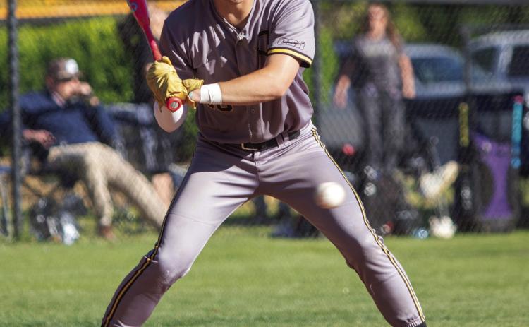 Calera Bulldog Logan Bumgarner is up to bat in a recent home game. Matt Swearengin | Durant Democrat