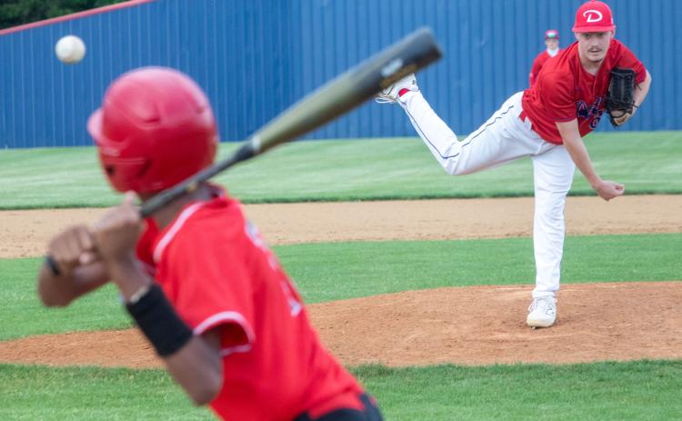 Durant Lion hurler Keyvan Dollar fires the ball during a recent game with Idabel. The Lions played Calera last Friday. Matt Swearengin | Durant Democrat