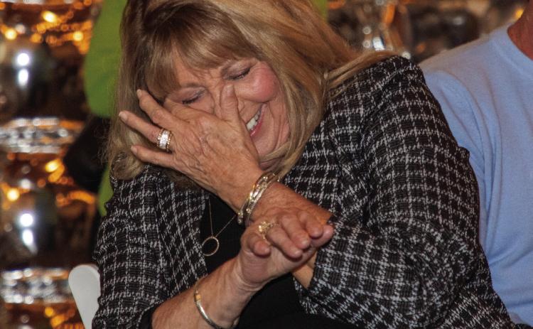 Retired Durant Area Chamber of Commerce Executive Director Janet Reed reacts during her retirement party last week at the Bell Tower Event Center.
