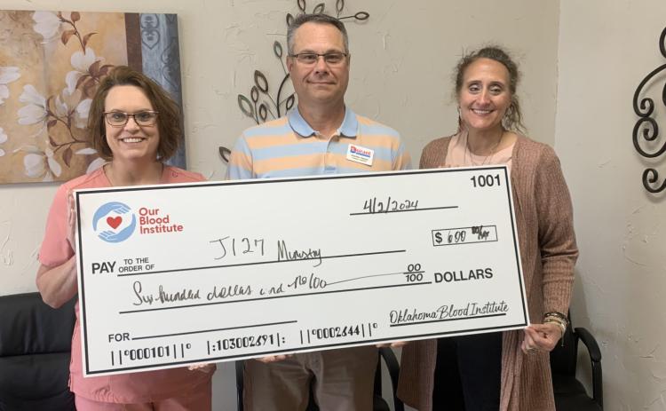 Cathy and Brad Harper, owners of Durant Physical Therapy, present the Our Blood Institute Greater Good check to J127 Ministry. Durant Physical Therapy exceeded their blood drive goal and by doing so, OBI donated funds to a 5013C charity as a way to give back to the community. Also shown is J127 director Adrean Stinnett. Photo provided | OBI