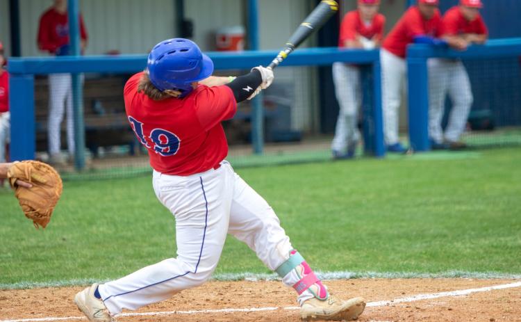 Lion Eli McClure hit a home run in the game with Idabel. Matt Swearengin | Durant Democrat