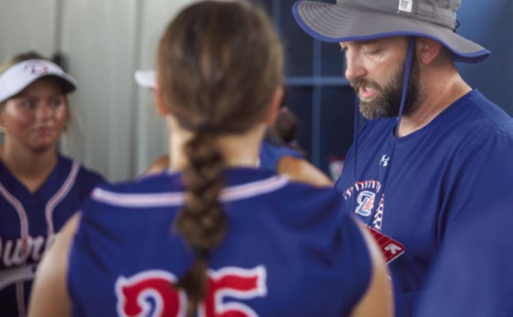 Matt Swearengin | Durant Democrat Durant Lady Lions softball head coach Jimmie Wyrick talks to players before a scrimmage last season. Wyrick is taking the reins as the Lions baseball coach and he will continue to coach the Lady Lions.