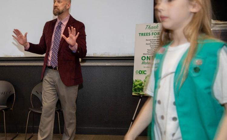 Jeremy Spence, chair of the Durant Sustainability Coalition, speaks before it was announced that T-Mobile awarded DSC a grant to plant trees in downtown Durant. Matt Swearengin | Durant Democrat