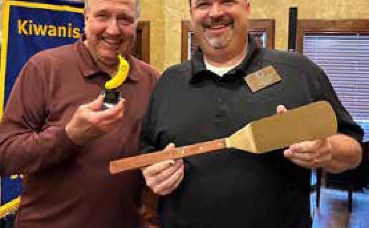 Awards were given to Kiwanis Pancake Ticket top salesmen. The Top Sales title went to Tommy Kramer, not shown. The coveted Golden Spatula Award was given to Jason Manous, right, leader of the winning sales team. Top Banana Award for top sales for the second-place team was presented to Bart Rustin, left.