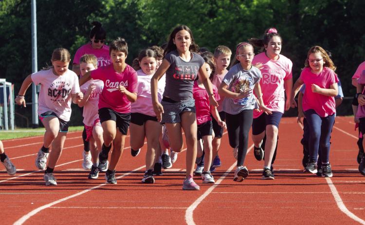 George Washington Elementary School third graders ran the second-annual Clara’s Run last week in remembrance of their classmate who died in a Christmas Eve 2024 car accident along with her father Will who was the Durant girls basketball coach. Clara’s run was held at the Durant High School track. Matt Swearengin | Durant Democrat
