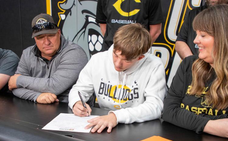 Calera Bulldog Logan Bumgarner signed a baseball scholarship offer with Redlands Community College in El Reno. Also shown are, Maddox Bumgarner, Jeremy Bumgarner, Logan Bumgarner and Katie Bumgarner. Matt Swearengin | Durant Democrat