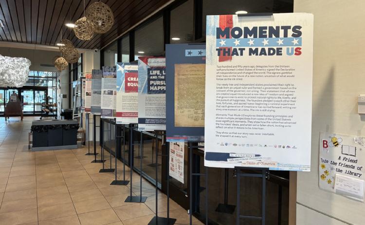 The Moments That Made US exhibition is on display at the Donald W. Reynolds Community Center &amp; Library. Photo provided