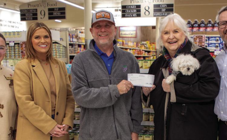 Matt Swearengin | Durant Democrat First United Bank had a canned food drive and Pruett’s Food contributed $550 which was used to purchase additional canned food. From left, Bailey Terrell, relationship banker at First United; Melissa Patterson, First United Spend Life Wisely ambassador; Mike Ritter, store manager; Pam Robinson, United Way director, and Brett Rogers, First United Community Bank president.