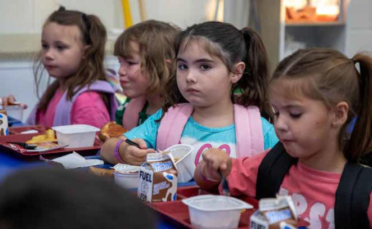 Eating breakfast before the start of the first day of school at Northwest Heights Elementary School are from left, Heidi Shye, Charli Clay, Paisley Mays and Kinsley Mays. Matt Swearengin | Durant Democrat