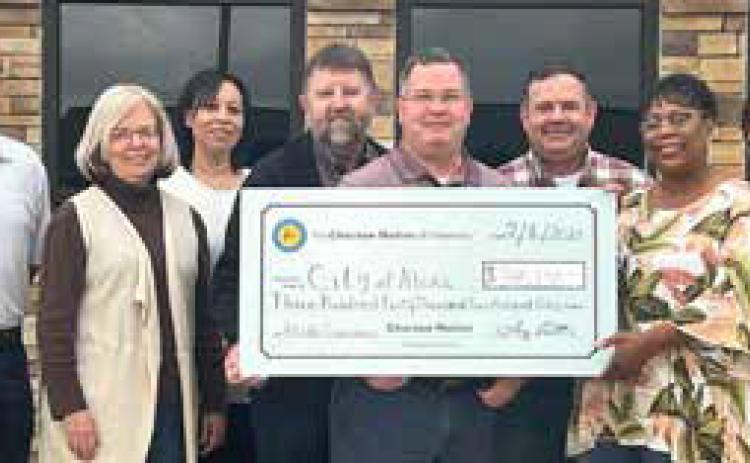 The Choctaw Nation has awarded funds to Atoka’s Downtown Greenspace Project. Shown are, Brad Erwin, Choctaw Nation Small Business Development, Colby Sherrill, City of Atoka, Cindy Wallace, Atoka tourism department, Ericka Pogue, City of Atoka, Danny Delay, Atoka Assistant Mayor, Michael Southard, Choctaw Development Fund, Brian Cathey, Mayor of Atoka, Carol Ervin, Atoka economic development, Kreg Haney, Choctaw Nation Economic Development. Photo provided | The Choctaw Nation