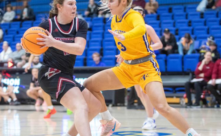 SE’s Stevie Stinchcomb faces a Henderson State player. Matt Swearengin | Durant Democrat