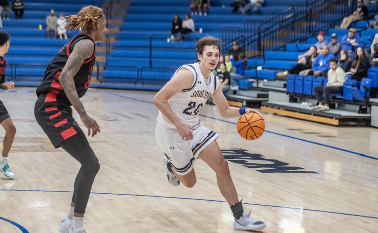SE’s Ethan Wilkerson moves down court in the game with Northwestern. Dan Hoke | SE