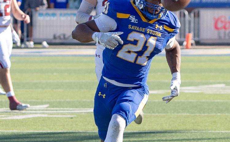 Southeastern Savage Storm running back Johnathon Cobb misses a pass during the