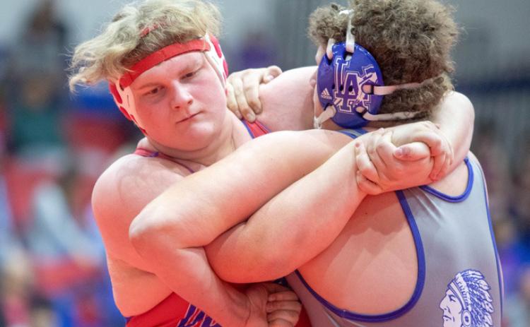 Lion Gaige Rocha takes on a Little Axe wrestler during a recent home dual. Durant wrestled at Madill on Dec. 19. Matt Swearengin | Durant Democrat
