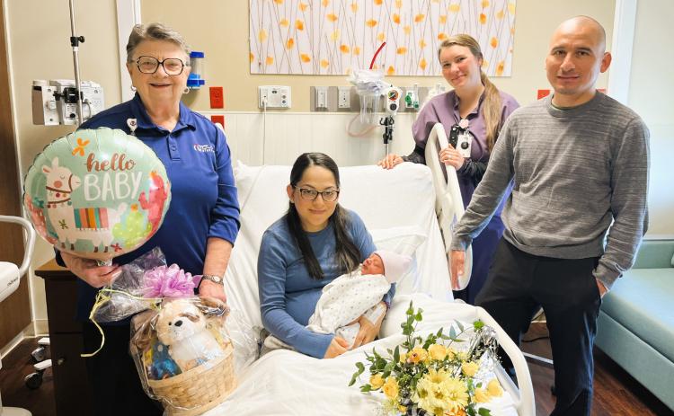 Texoma Medical Center welcomed its first baby of the new year, Luis Angel. Shown are, Pat Emery, president, TMC Volunteers; Maria Lopez, mother; Hannah McMakin, BSN, RN Texoma Medical Center nurse, and Braulio Cruz, father. Photo provided | TMC