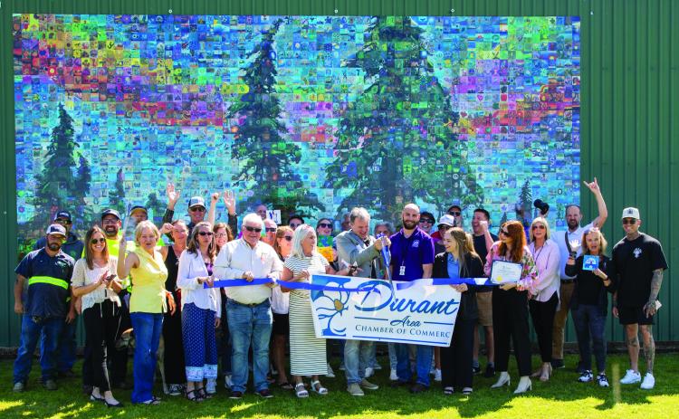 A ribbon cutting from the Durant Area Chamber of Commerce was held for the unveiling of the America Connects Nature’s Adventure Mural Mosaic at the Durant Multi-Sports Complex. Matt Swearengin | Durant Democrat