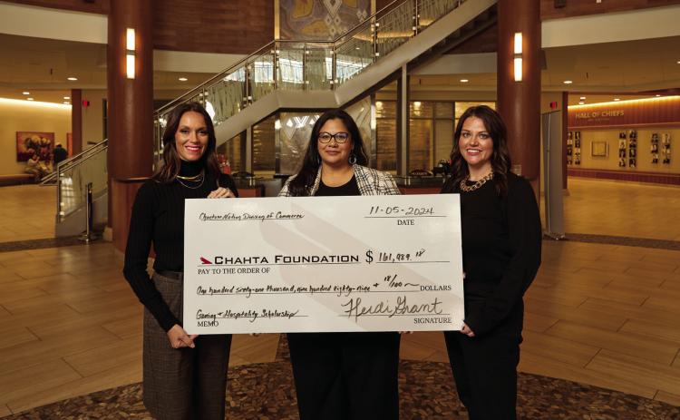 Presenting the check for the Chahta Foundation Gaming &amp; Hospitality Scholarships are from Left to right: Choctaw Nation Senior Executive O_cer of Commerce Heidi Grant; Executive Director of the Chahta Foundation, Angela Palmer; and Choctaw Nation Senior Director of Gaming Brand and Partnerships Erica Kosemund. These funds raised through the annual golf tournament are matched by the Choctaw Nation. Photos provided | Choctaw Nation