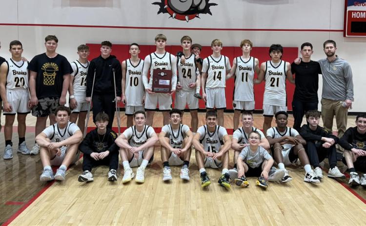The Caddo Bruins pose after winning the Class A, Area II Boys Consolation Championship Game Photos from Caddo Schools