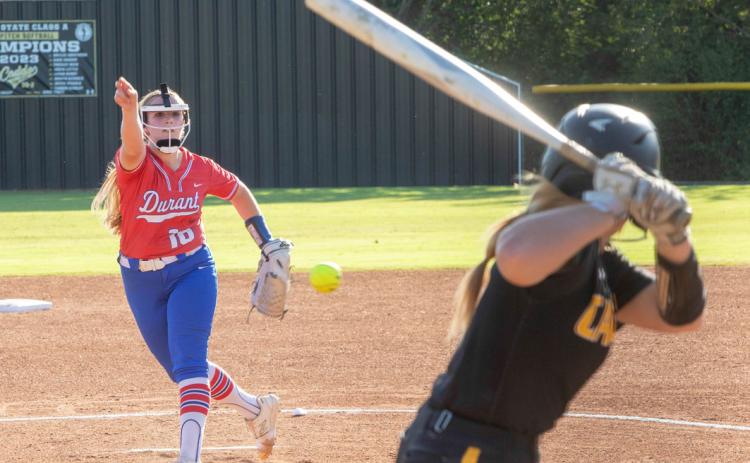 Durant Lady Lion pitcher Addi Pratt fires the ball at a Caddo batter during a recent game. Matt Swearengin | Durant Democrat