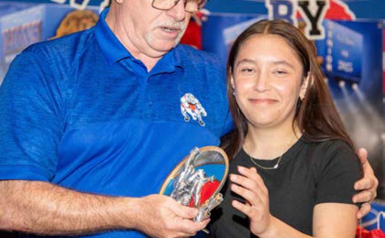 Durant wrestler Lilly Stilwell received the Lion Heart award during the recent Durant High School Wrestling banquet. Head coach Jim Taylor presented the award.