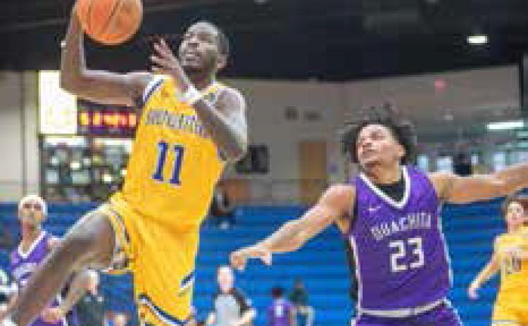 Southeastern baskeball player Jalen Williams goes up for a basket in the game with Ouachita Baptist at Bloomer Sullivan Arena.